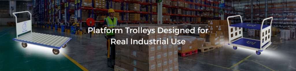 Platform trolleys designed for real industrial use in warehouses, showing heavy-duty trolleys operating in a large logistics facility.