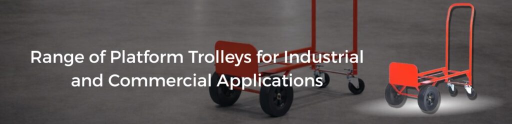 Multiple platform trolley models displayed on a factory floor for industrial and commercial material handling use